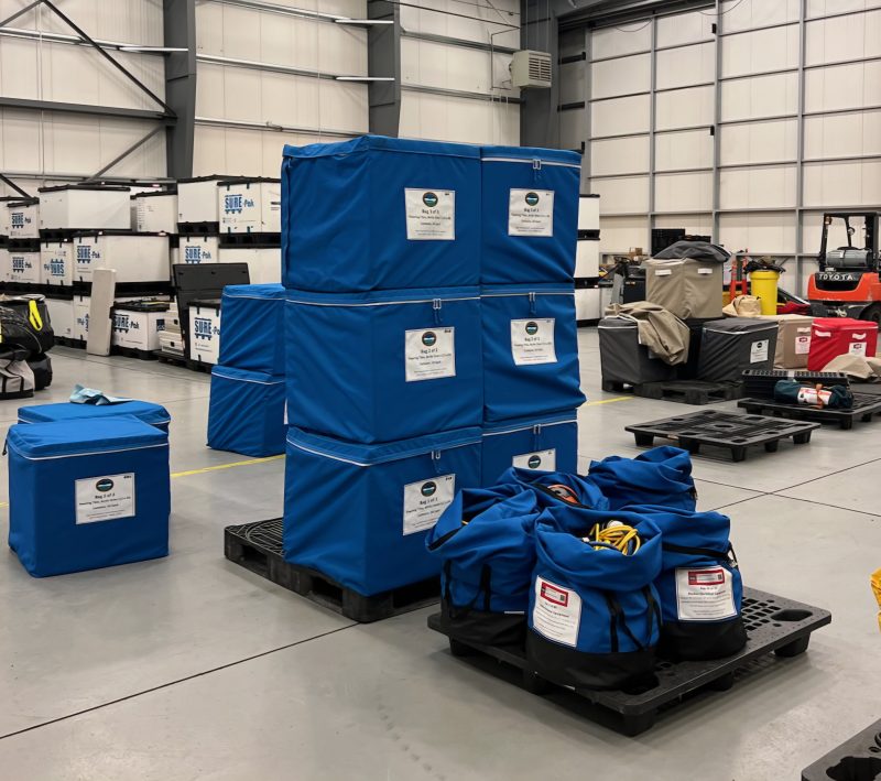 A stack of custom bags made for equipment headed to the arctic
